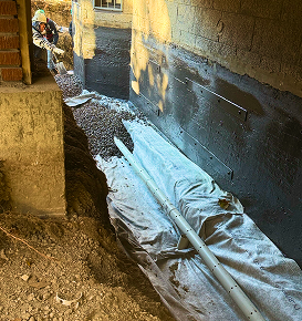 Remblayage après installation du drain français